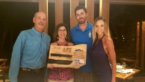 David and Brenda Dachner of the Grand Roatan being presented a plaque in honor of Brenda's brother, Captain Douglas L. Bradt,  who was killed in action (KIA) in Desert Storm and their support of Warfighter Scuba by Nick and Dawn Powers.